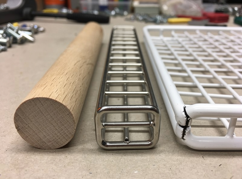Side by side comparison of three shelf materials: unfinished oak dowel, 304 stainless steel wire grid, and white plastic-coated wire with a crack at the weld